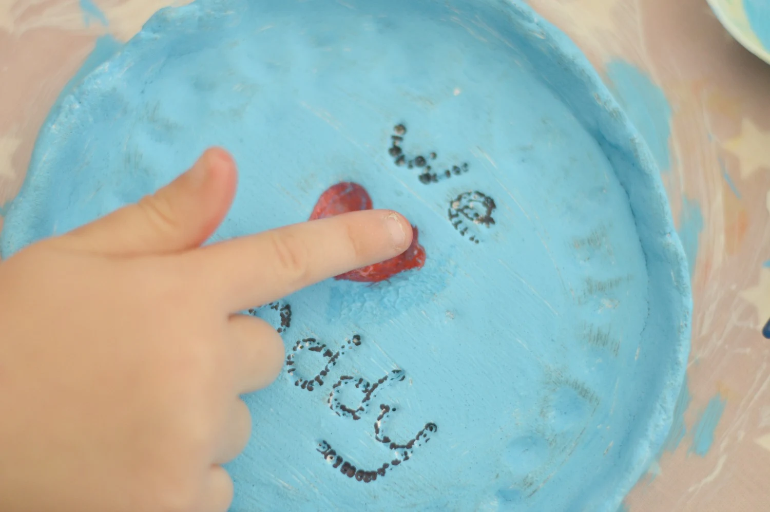 Thumbprint heart dish