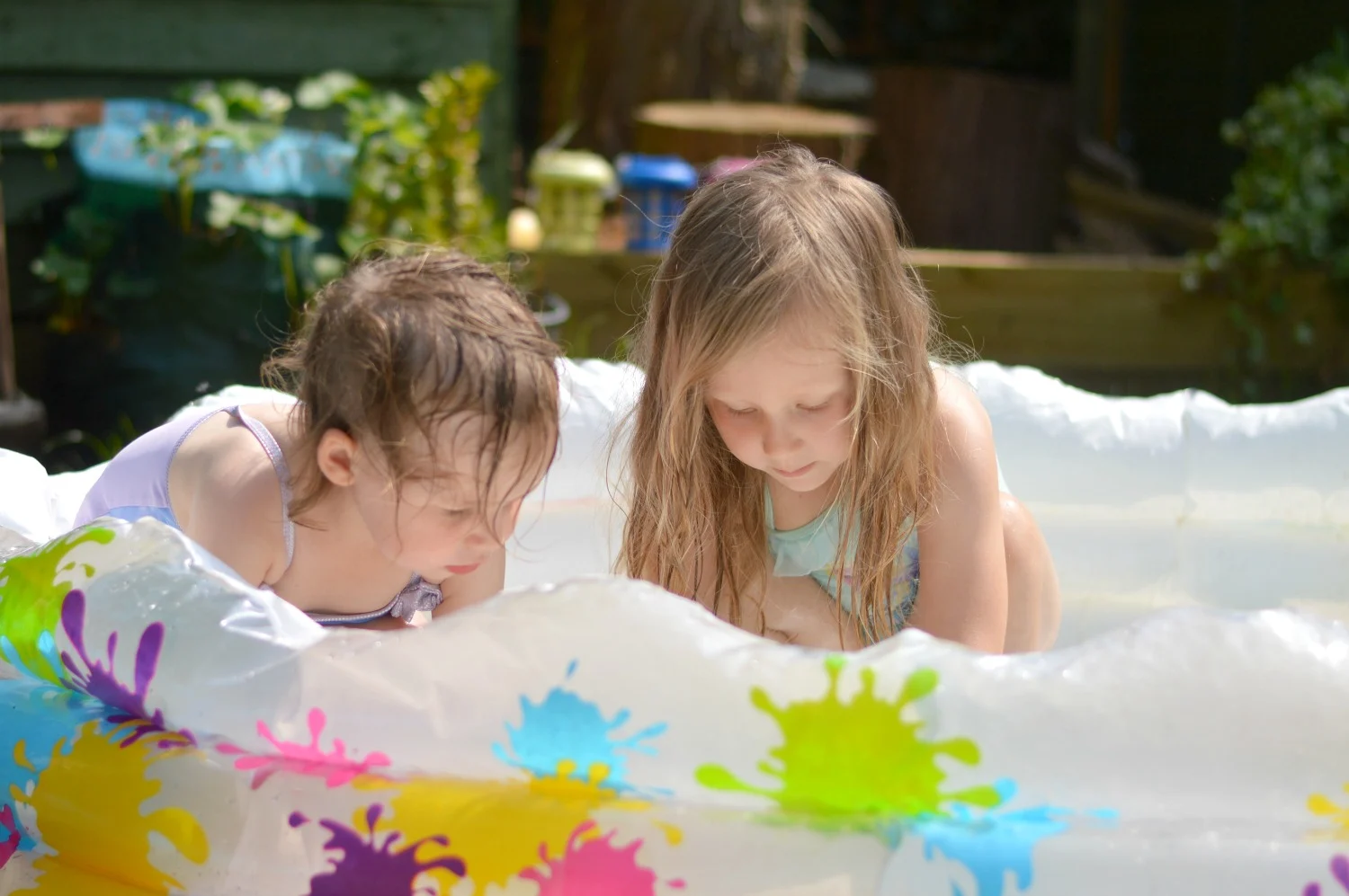 Girls in the paddling pool June