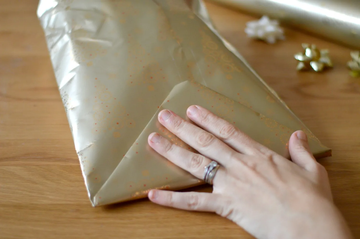 Folding the top of the gift bag
