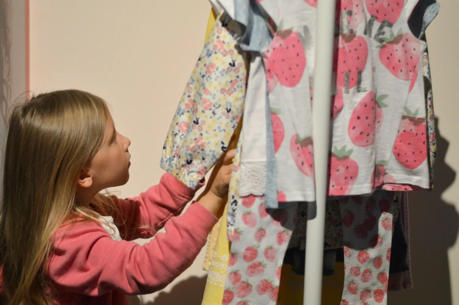 Gracie browsing the clothes