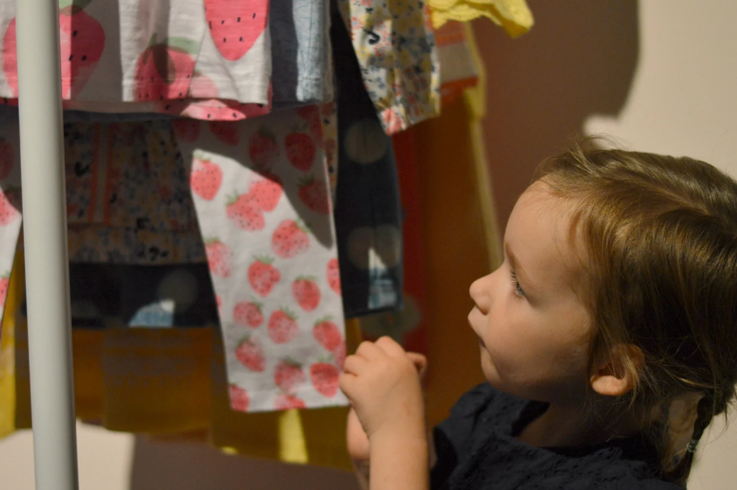 Lils browsing the clothes