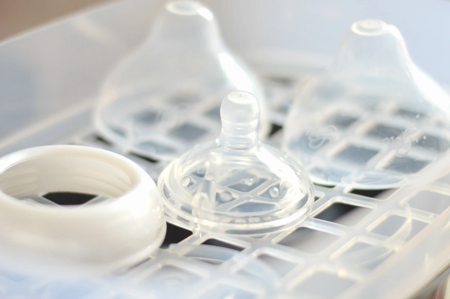 teats and lids in steriliser