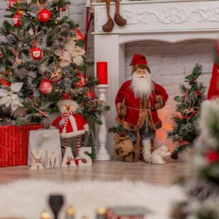 Christmas decorations by fireplace