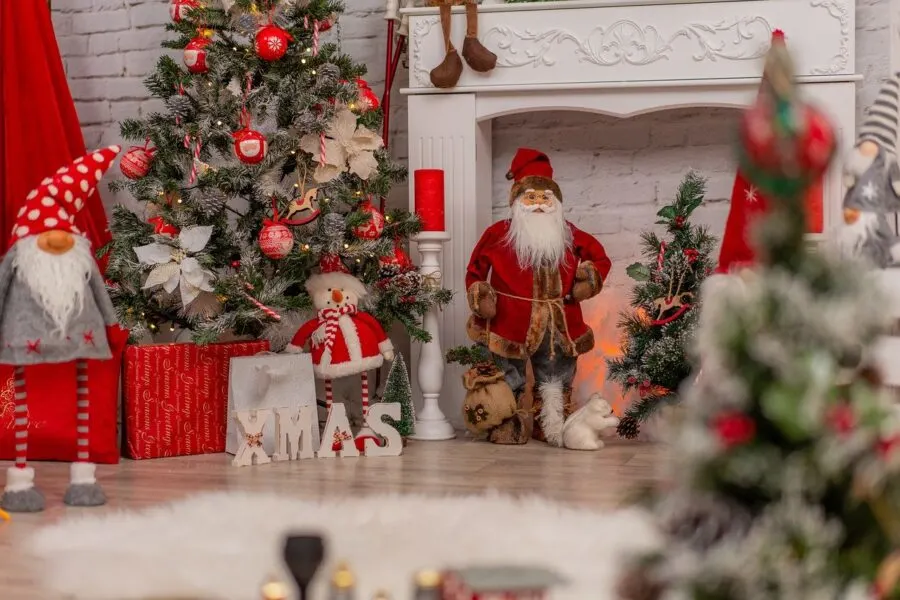 Christmas decorations by fireplace