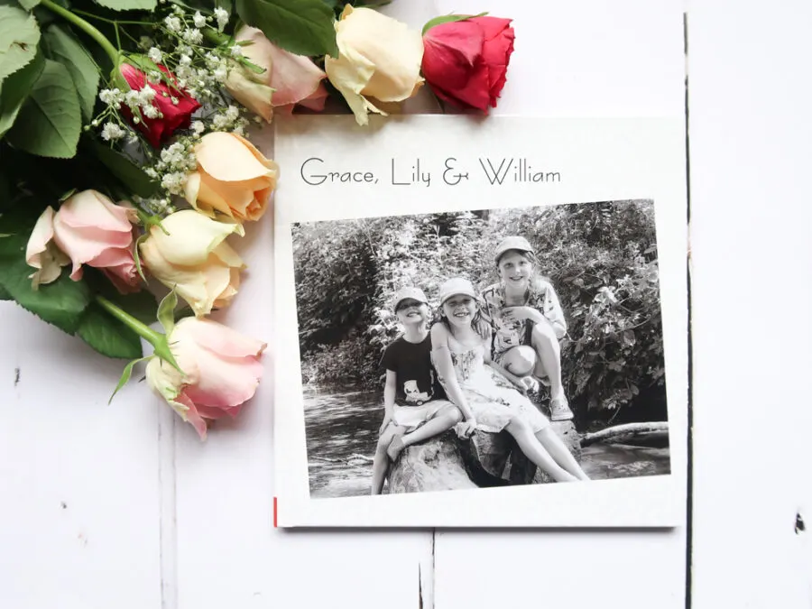 a boots photobook next to flowers