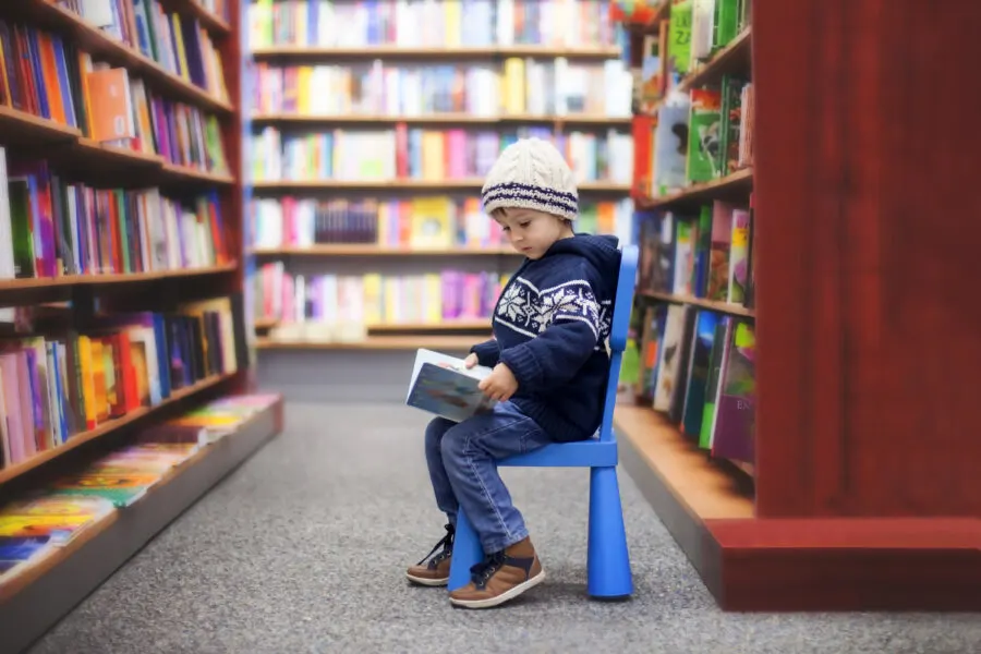 child in a library