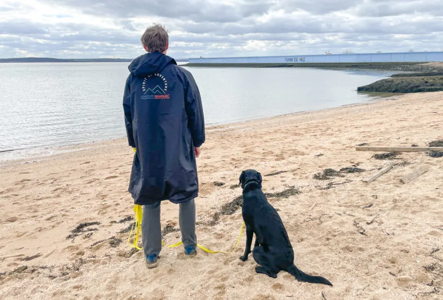 Man and a dog on the beach