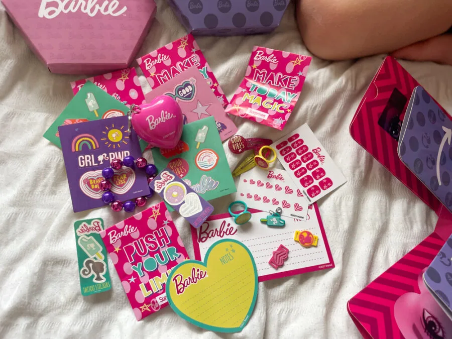 Girl opening Barbie surprise box