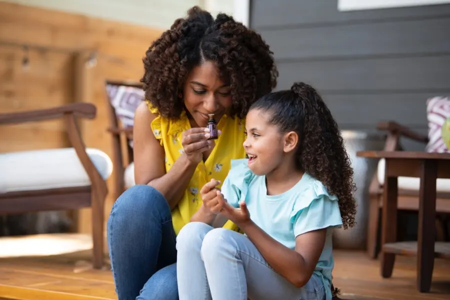 woman and child with essential oil