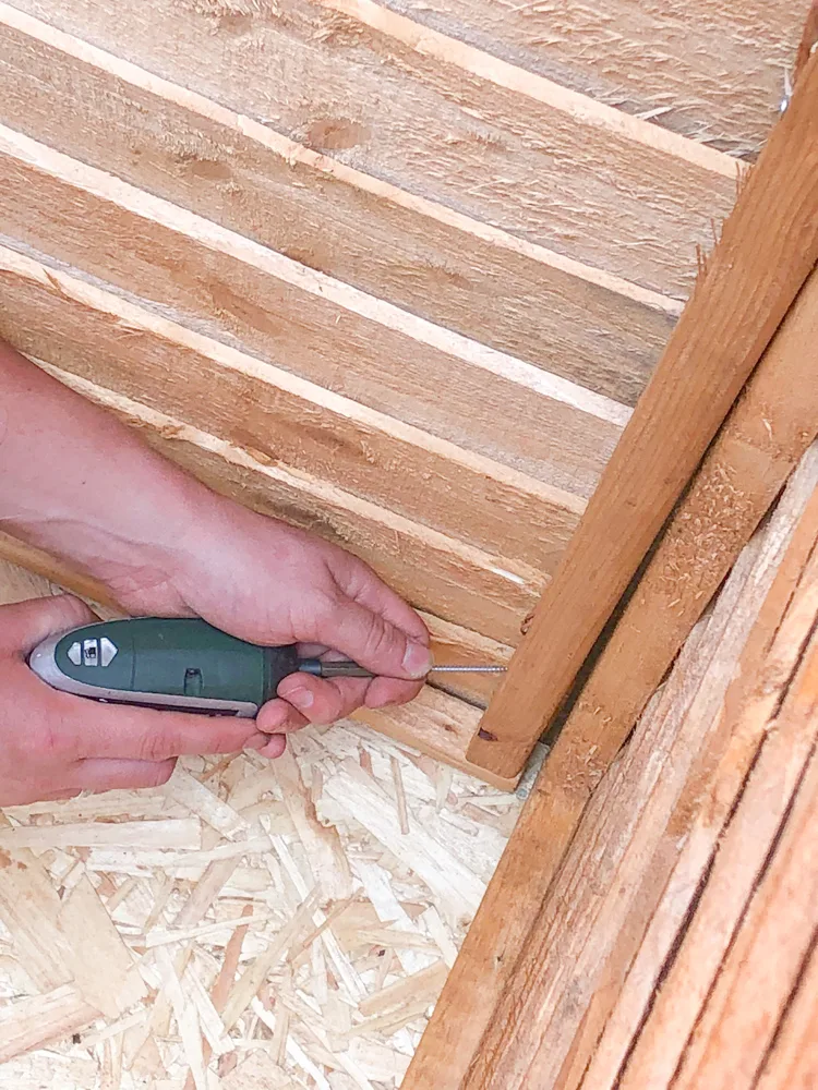 Attaching floor to the walls of bike shed