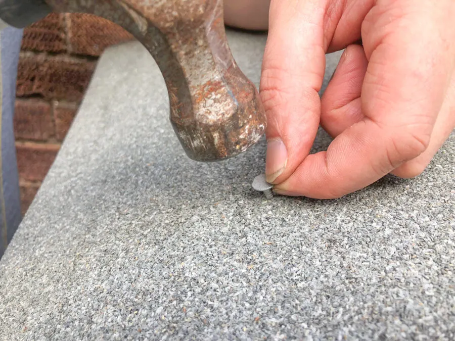 tacking roof felt onto bike shed