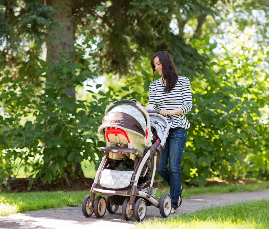 woman pushing pram