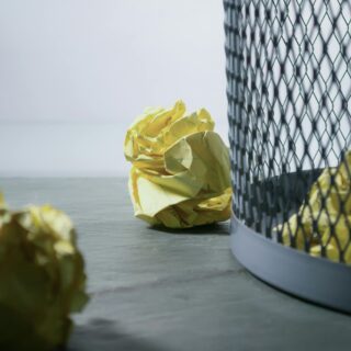 paper by a waste paper basket