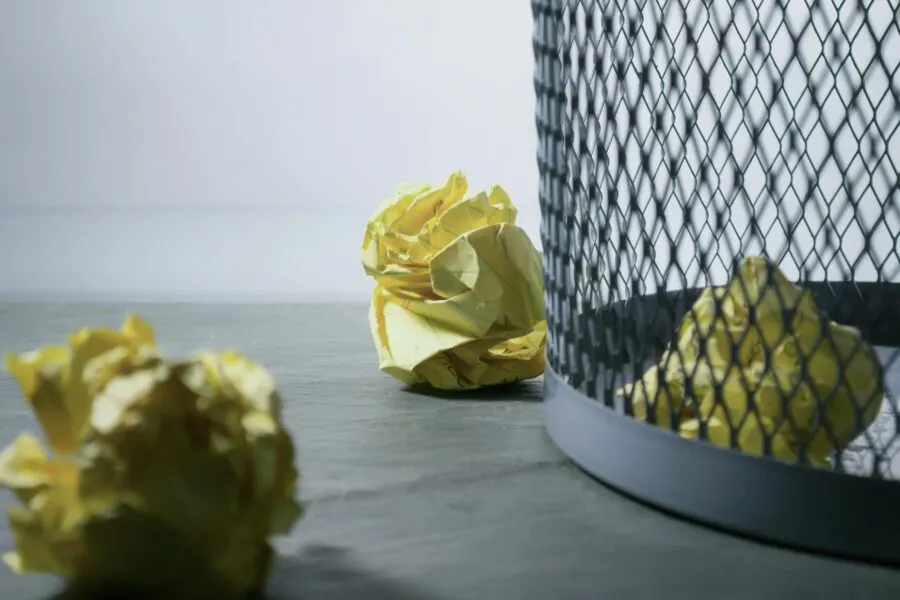 paper by a waste paper basket
