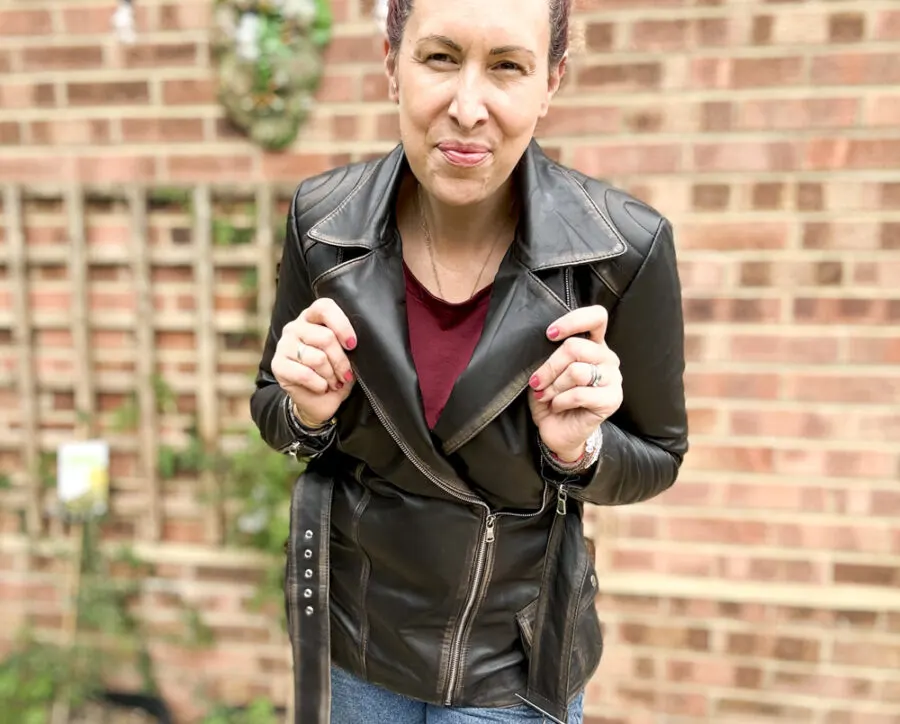 Woman wearing leather jacket and jeans